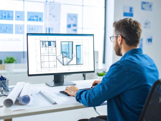 Designer preparing a glass layout and quote