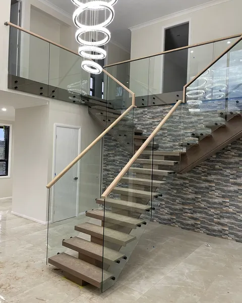 Glass balustrade on stone stairs, side view