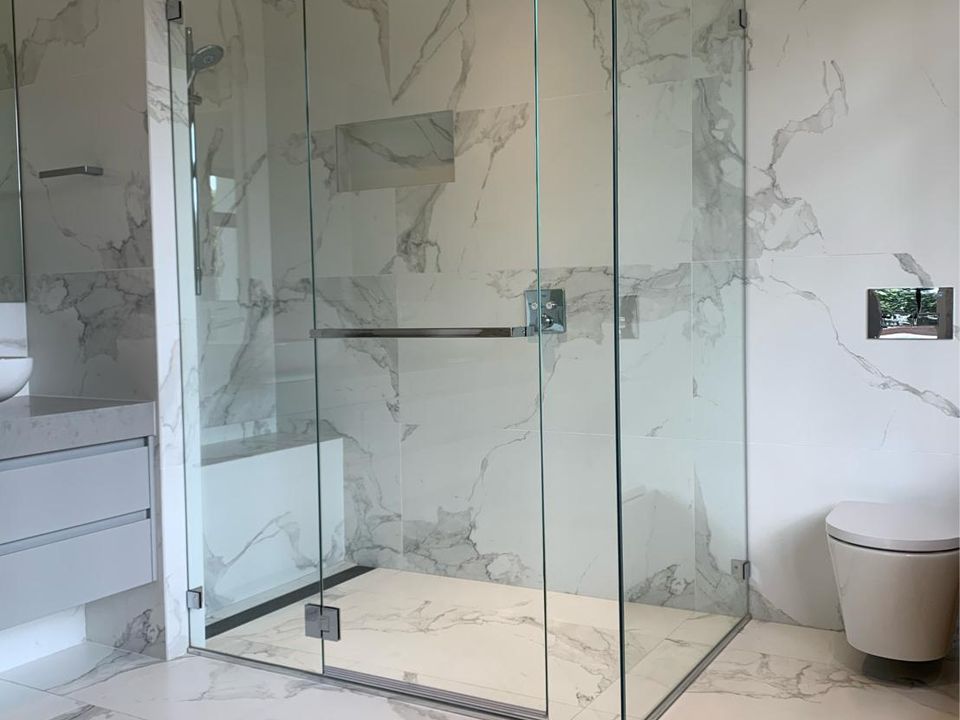 Frameless 10 mm glass shower screen in a modern bathroom